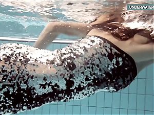 Loris blackhaired teenage swirling in the pool