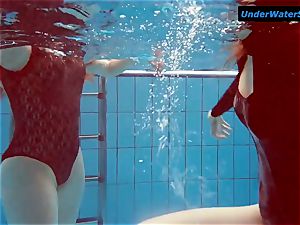 two sizzling teenagers underwater