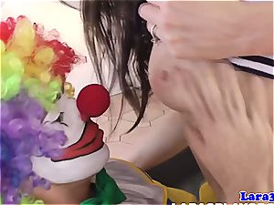 uber-sexy brit girl enjoys a clown pulverizing her coochie